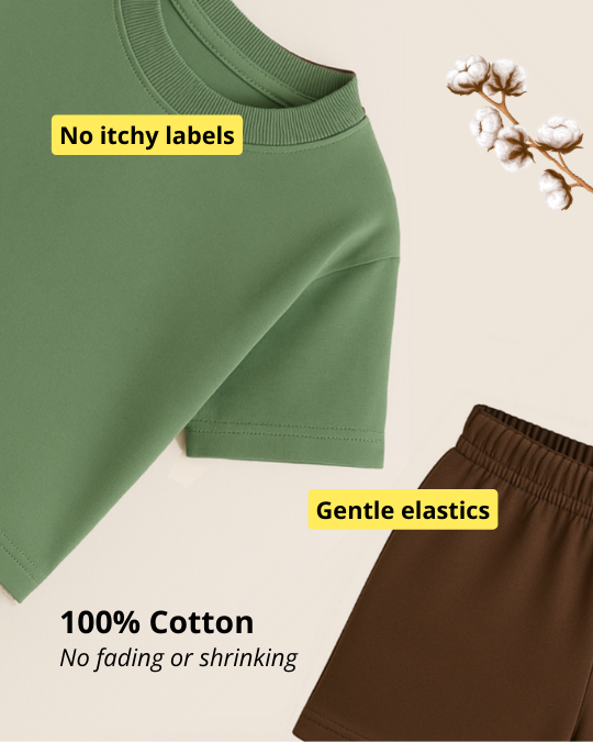 Green shirt and brown pants with text about no itchy labels, gentle elastics, and 100% cotton.