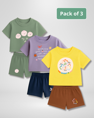 Pack of three children's t-shirts and shorts with colorful designs on a light gray background.
