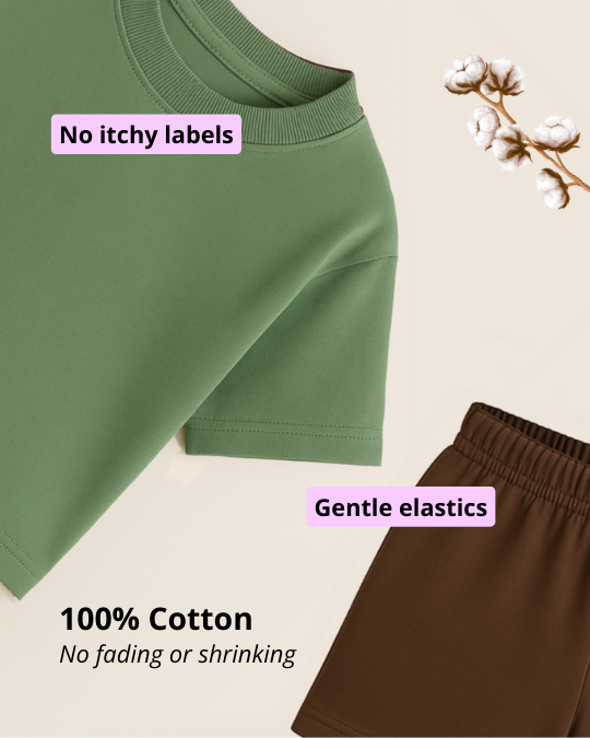 Green shirt and brown pants with text about no itchy labels, gentle elastics, and 100% cotton.
