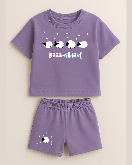 Purple children's t-shirt and shorts set with sheep graphics on a beige background