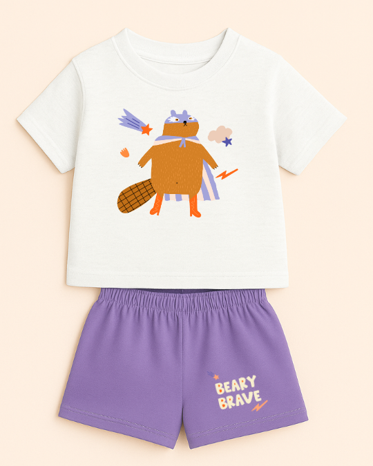 Children's outfit with a t-shirt and shorts featuring a bear graphic and 'Beary Brave' text on a beige background.