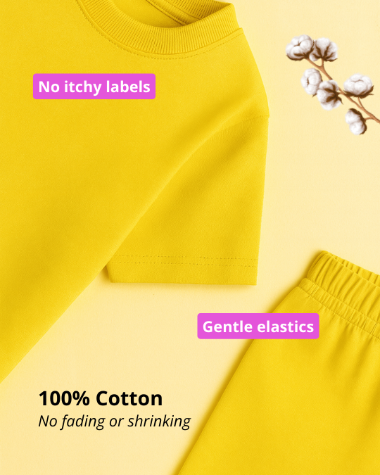 Yellow fabric with text about no itchy labels, gentle elastics, and 100% cotton on a yellow background.