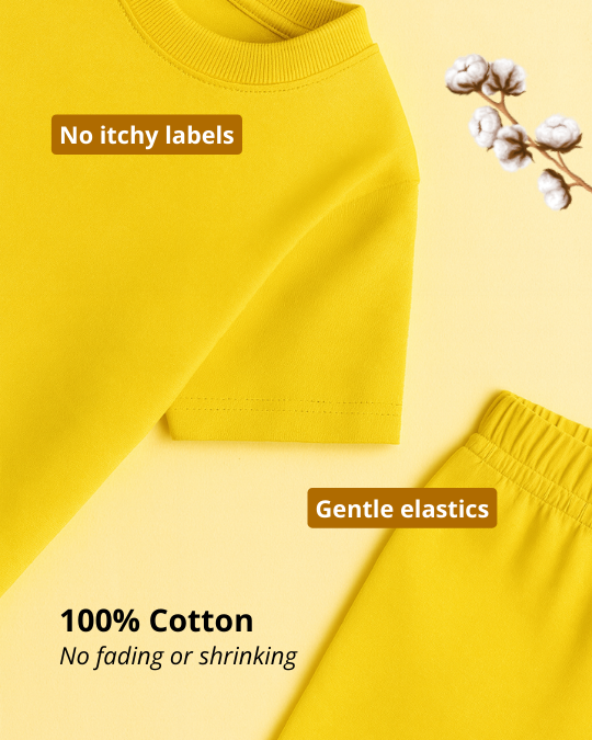 Yellow fabric with text about no itchy labels, gentle elastics, and 100% cotton on a yellow background.