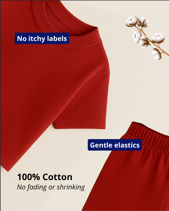 Red garment with text about no itchy labels, gentle elastics, 100% cotton, and no fading or shrinking on a beige background.
