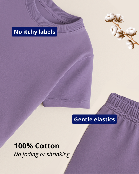 Purple shorts with text highlighting features like no itchy labels, gentle elastics, 100% cotton, and no fading or shrinking.