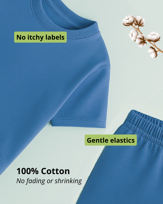 Blue children's pants with text highlighting features on a light green background
