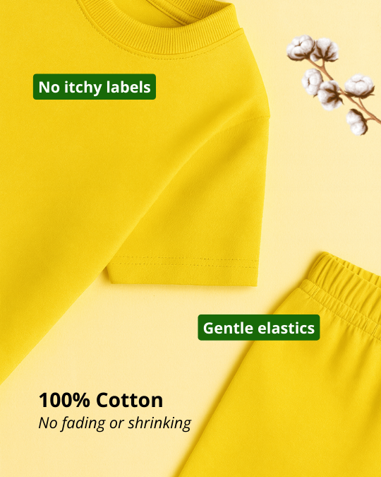 Yellow fabric with text about no itchy labels, gentle elastics, and 100% cotton on a yellow background.