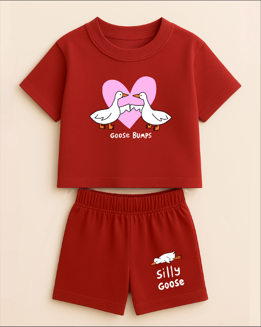 Red children's t-shirt and shorts set with cartoon goose design on a beige background
