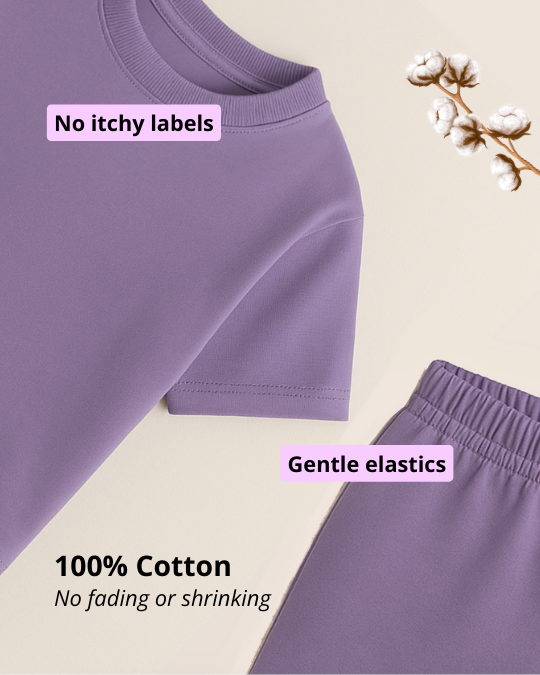 Purple garment with text highlighting features like 'No itchy labels', 'Gentle elastics', and '100% Cotton'.