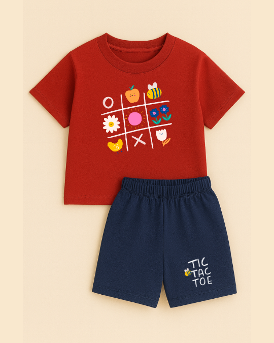 Red t-shirt with colorful graphics and navy shorts on a beige background