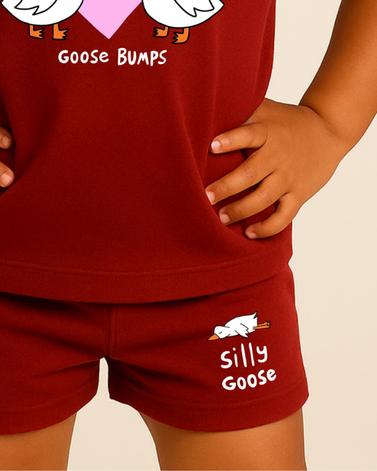 Red pajama set with 'Goose Bumps' and 'Silly Goose' text on a beige background