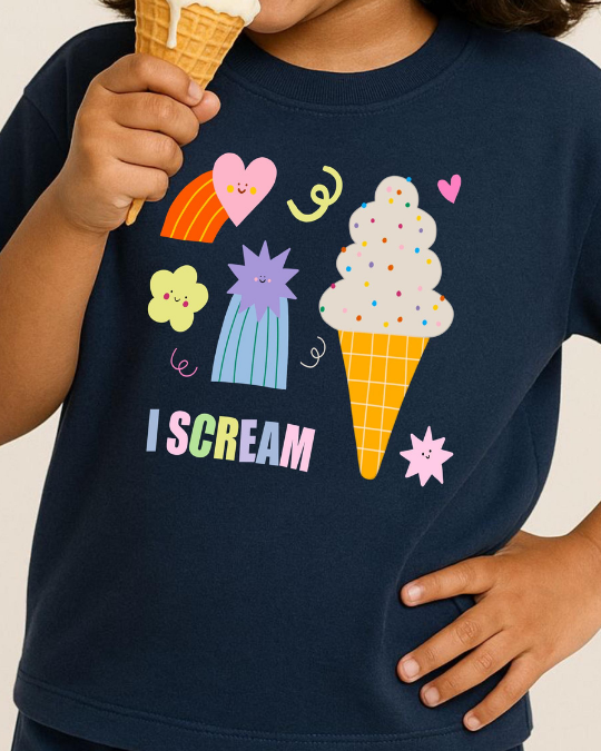 Child wearing a navy blue t-shirt with ice cream cone and colorful graphics, holding an ice cream cone.