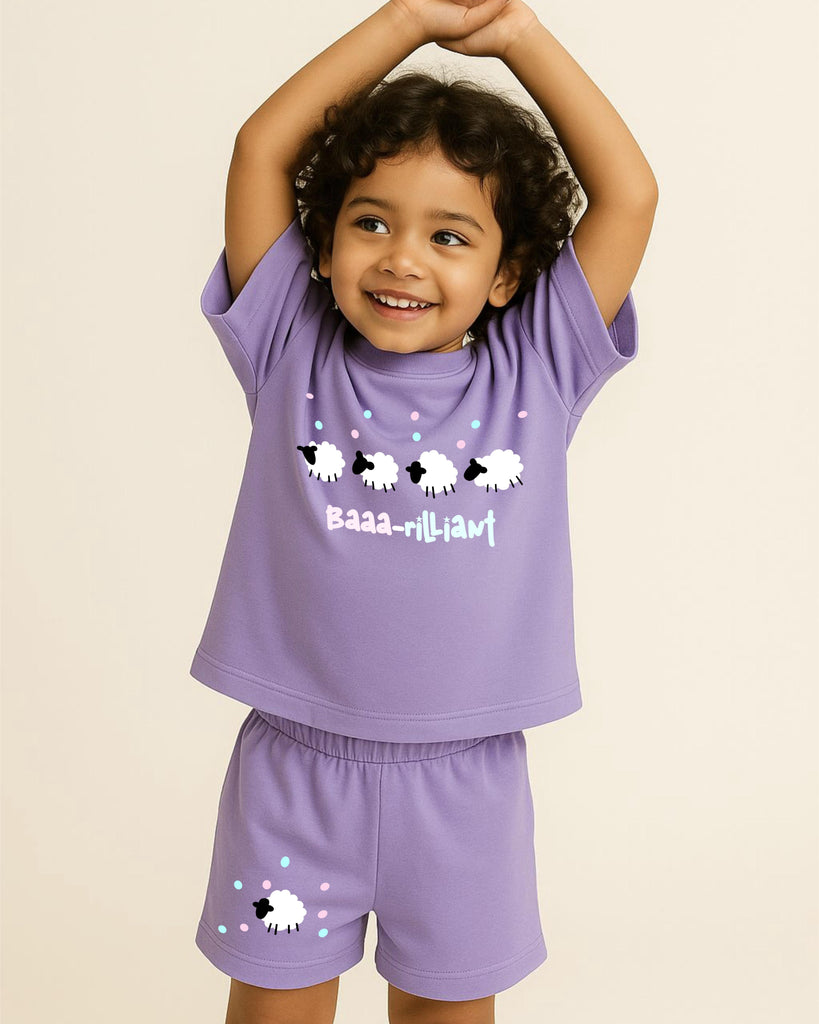 Child wearing a purple outfit with sheep designs on a beige background