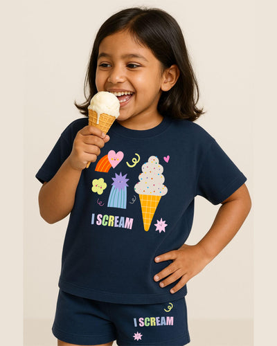Child wearing a navy blue t-shirt with ice cream graphics and 'I Scream' text, holding an ice cream cone.
